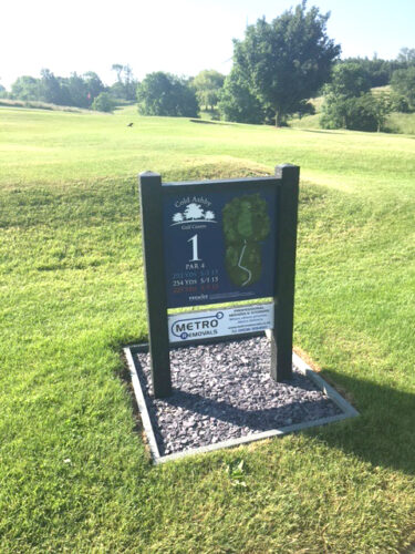 Golf course sign on tee
